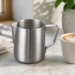 Stainless Steel Milk Frothing Jug, in a kitchen setting
