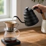 Stainless Steel Pour Over Kettle with Lid Thermometer — in use, pouring into a dripper Stainless Steel Pour Over Kettle with Lid Thermometer, in use, pouring into a dripper