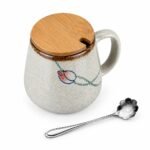 Ceramic Mug with Lid and Spoon, top three-quarter angle Ceramic Mug with Lid and Spoon